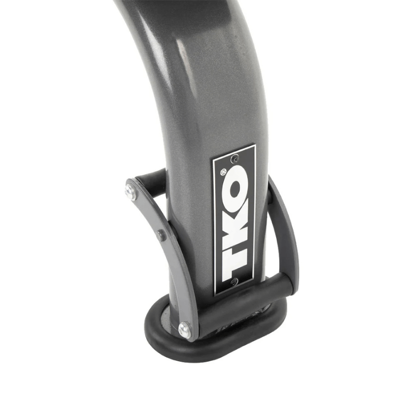 Close-up of the TKO FID Bench support featuring the TKO logo and sturdy design for stability during workouts.