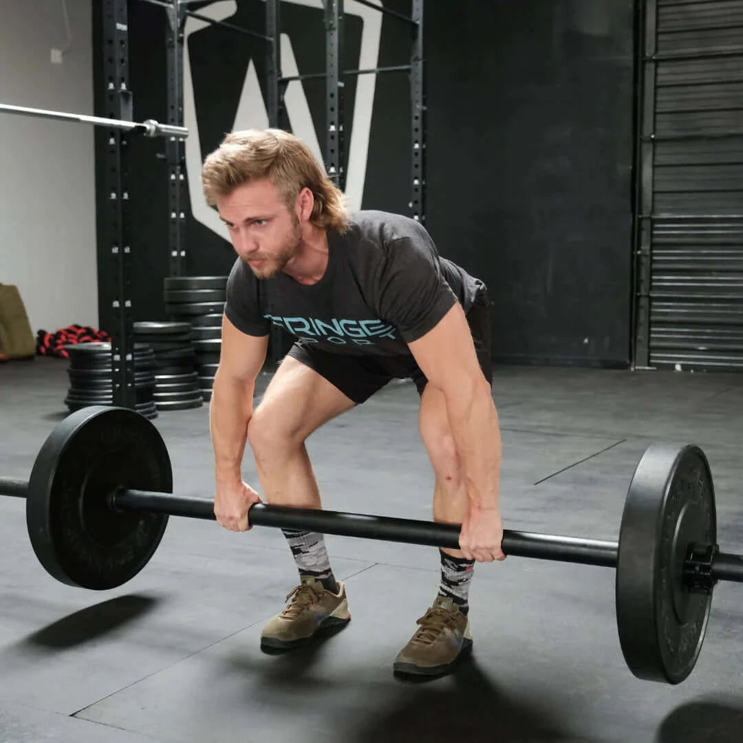 Fringe Sport 20kg Axle "Fat" Bar - front view with weightlifter