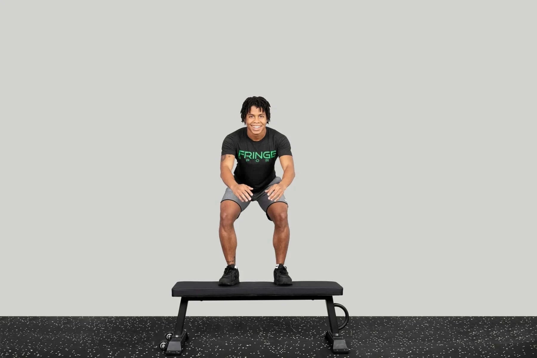 Fringe Sport Bad Ass Utility Flat Bench - side view with model